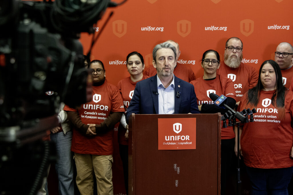 Gavin McGarrigle with Amazon Workers